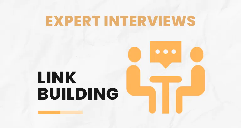 Two people talking at a table, illustrating expert interviews for link building