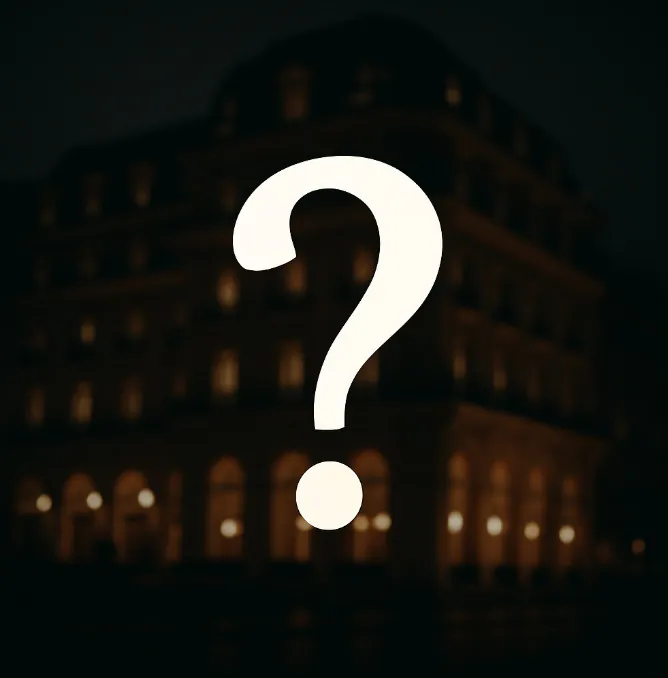 Question mark over a hotel at night: the client, an unnamed hotel chain