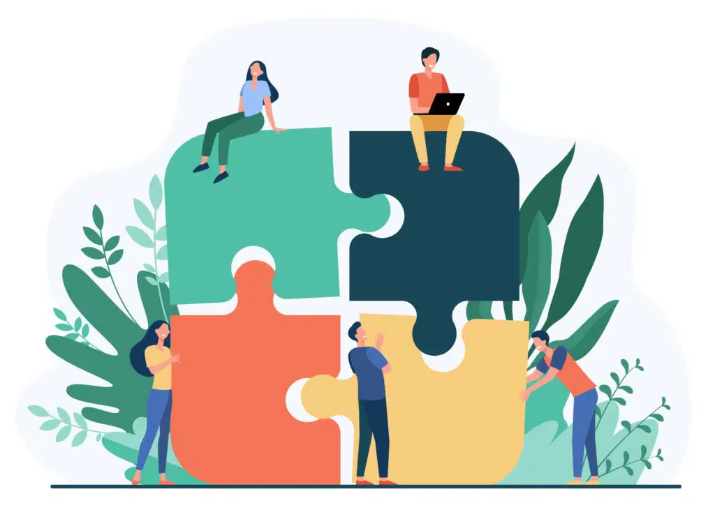 Team fitting puzzle pieces together illustrating the advertorial in a communication strategy