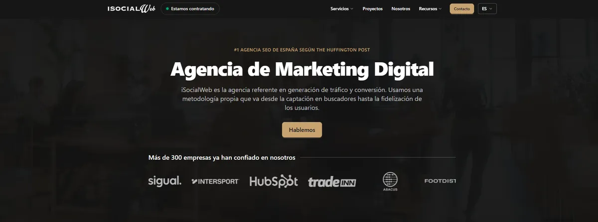 iSocialWeb home page with client logos such as Intersport and HubSpot