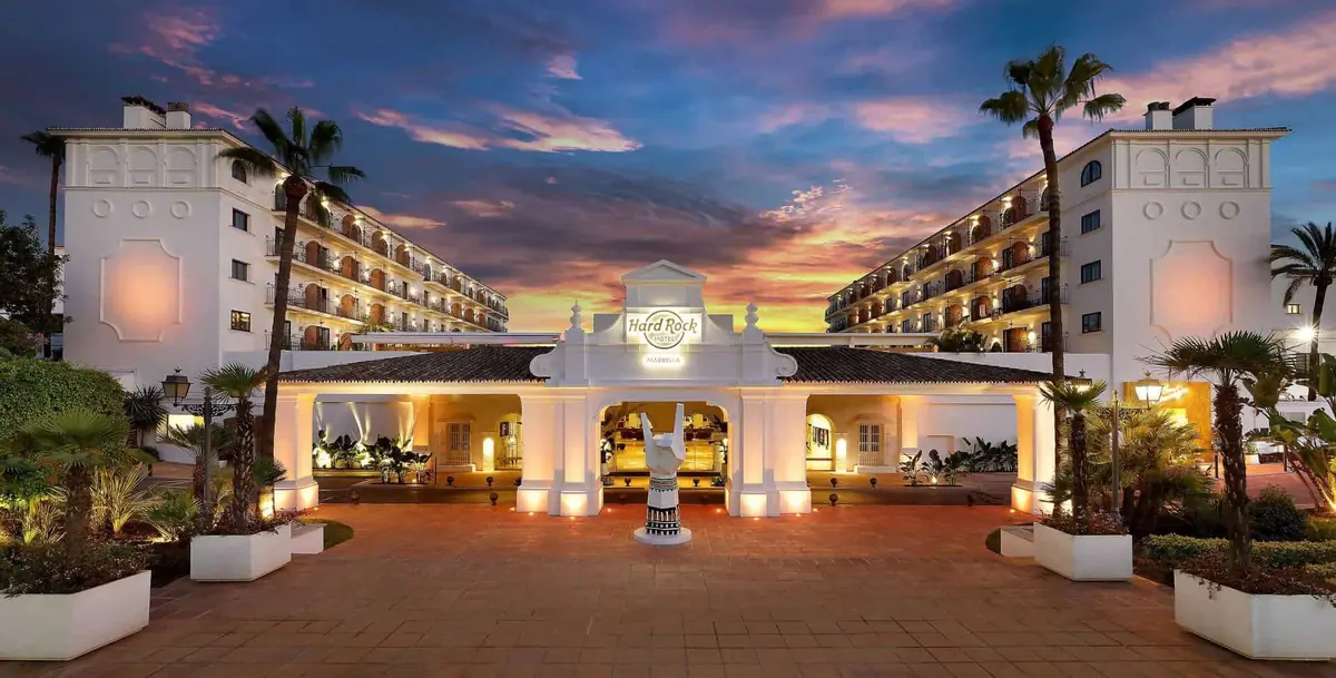Hard Rock Hotel Marbella at dusk, example of the tourism and hospitality sector